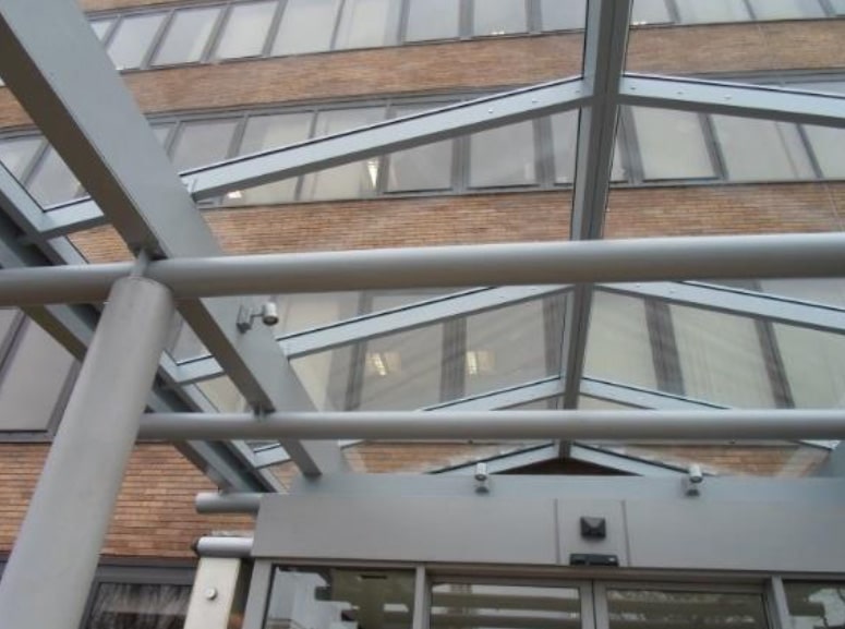 A modern glass canopy was installed to enhance the office block entrance