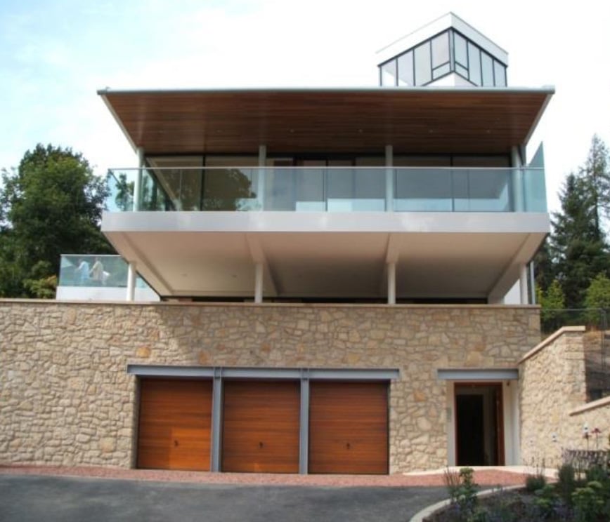 Architect's design in Glasgow, Scotland includes specialist glass balustrade with privacy screen